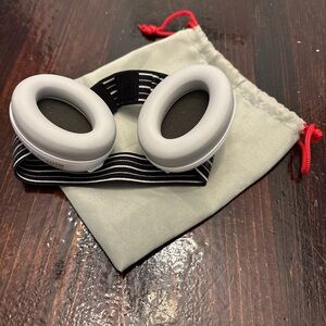 Alpine Black and White Ear Protection with Red Tag